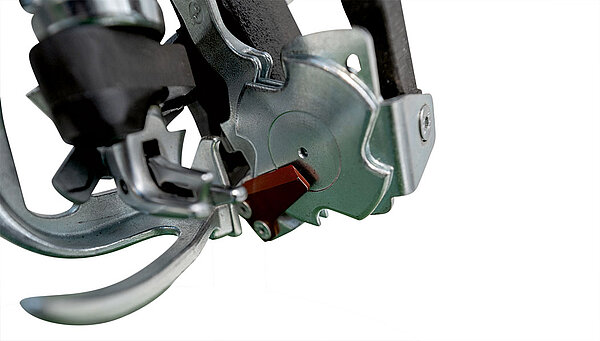 Poulie de maintien de ficelle avec couteau