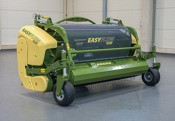 Avec rouleau tasse-andain