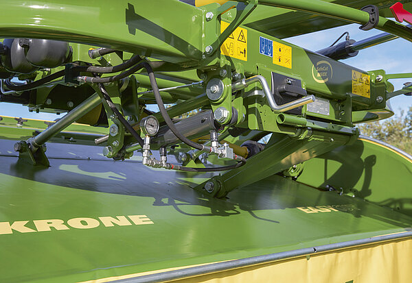 Réglage hydraulique de la longueur de coupe