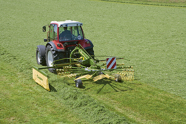 Andaineurs rotatifs à dépose latérale KRONE